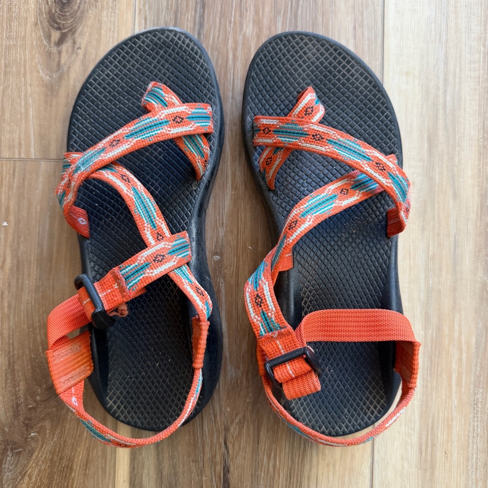 Women’s size 9 orange Chaco sandals with toe strap